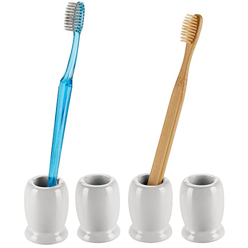mDesign Juego de 4 vasos para cepillos de dientes modernos y compactos – Portacepillos de dientes redondos hechos de cerámica – Accesorios de baño de pie para lavabo o muebles con espejo – gris claro